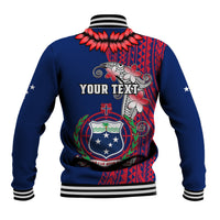 Blue unisex varsity baseball jacket with back red tribal crest graphic and striped ribbed hem cuffs