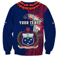Blue Samoa sweatshirt with red floral tribal back print, crest, and 'Your Text'