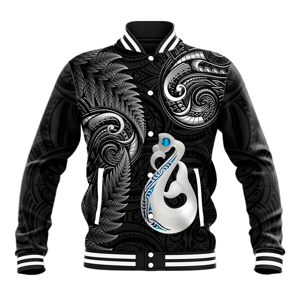Black baseball jacket with patterned Maori-style artwork, button front, ribbed collar