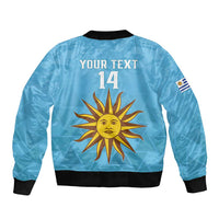 Light blue bomber jacket with black ribbing and back print of sun, 'YOUR TEXT 14'