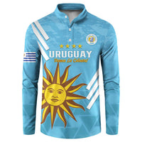 Light blue button-front football sweatshirt with Uruguay crest and sun graphic on front