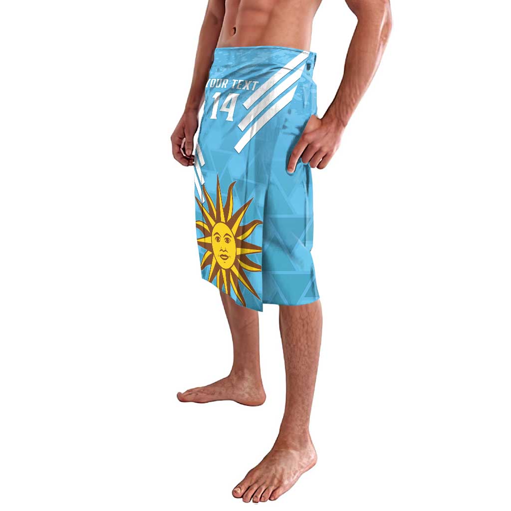 Blue football lavalava skirt in side view with sun emblem and 'YOUR TEXT 14'.