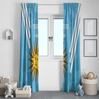 Blue window curtain panels with white stripes and sun Uruguay mascot