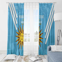Pair of blue window curtains with white stripes and large sun Uruguay crest