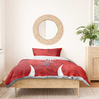 Red Chile football bedding set with two pillows and white stripes on a duvet cover