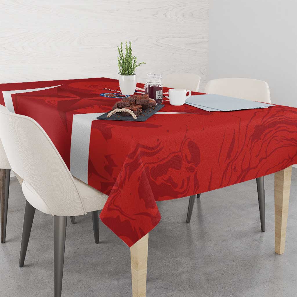 Red tablecloth with white stripes and detailed football-themed printed pattern