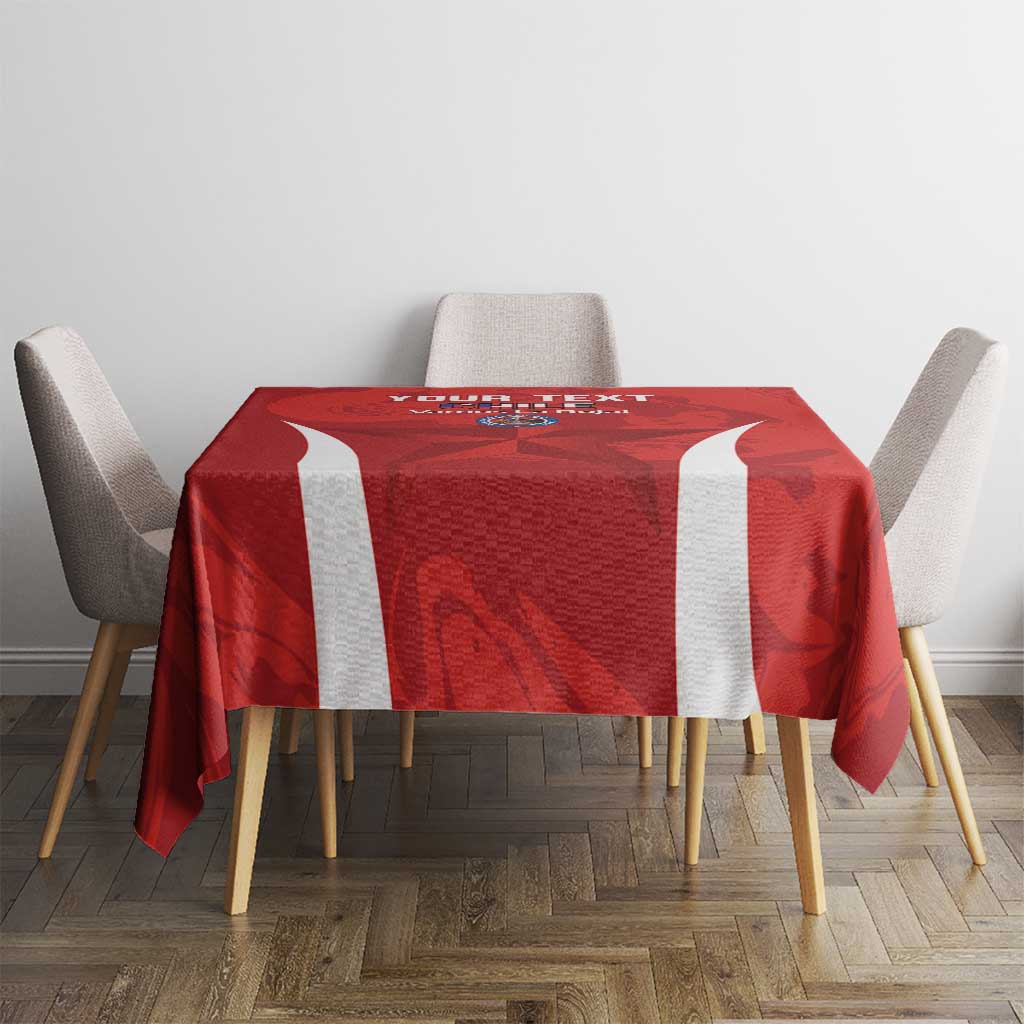 Red tablecloth with central football-themed print and vertical white side stripes