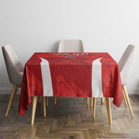 Red tablecloth with central football-themed print and vertical white side stripes