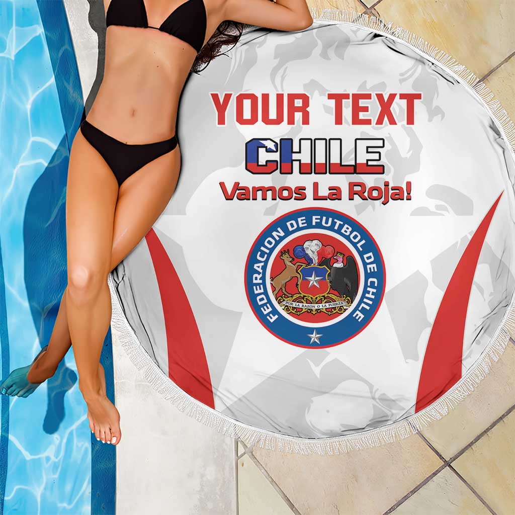 White round beach blanket with fringe edge, Chile crest and red diagonal stripes, poolside view.