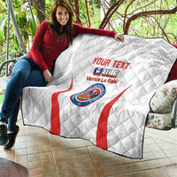 Custom Chile football quilt draped on outdoor seating, white with red stripes