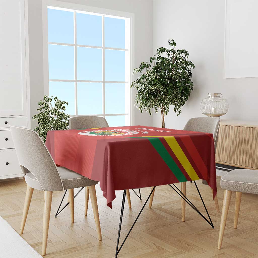 Red football tablecloth on dining table with Bolivia crest and diagonal stripe design