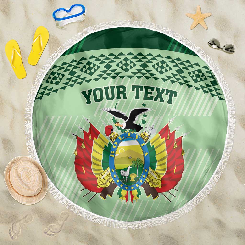 Round sea-green beach blanket with white fringe, crest graphic and 'YOUR TEXT' centered.