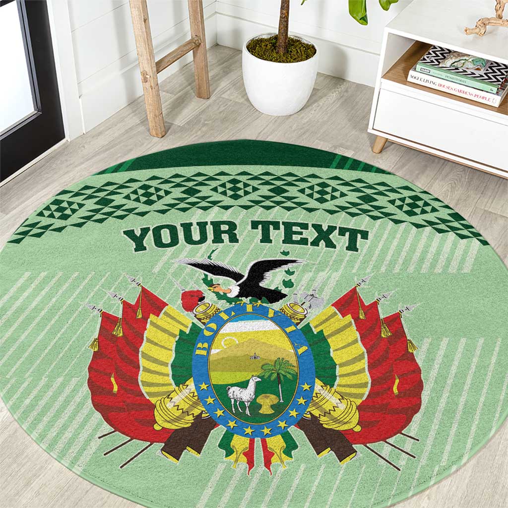 Sea green round football rug with 'YOUR TEXT' lettering and winged crest