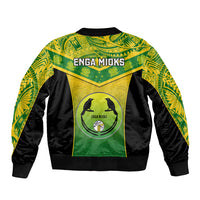 Unisex green and black bomber jacket with back graphic circle and 'ENGA MIOKS' lettering.