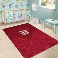 Red area rug with rose pattern and 'YOUR TEXT' center patch on a rectangular rug