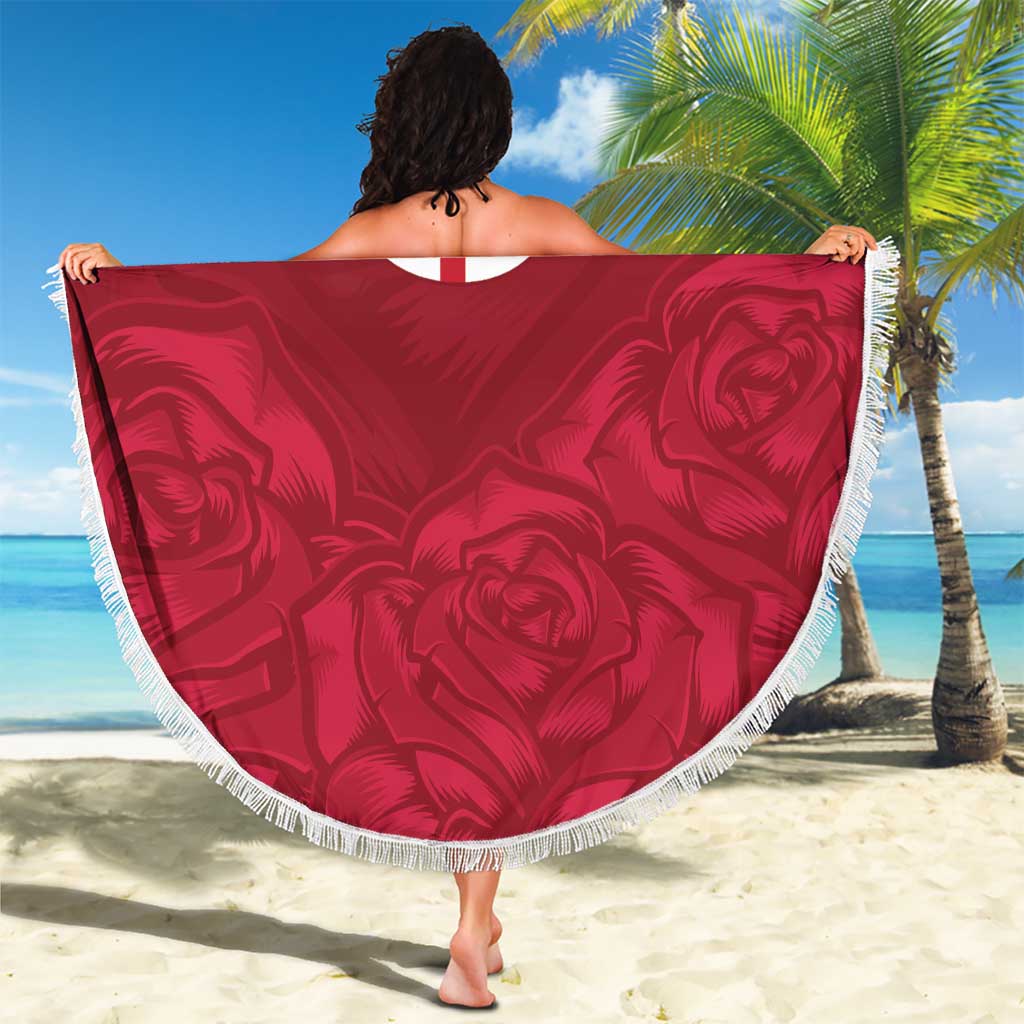 Red round beach blanket with white fringe and rose pattern