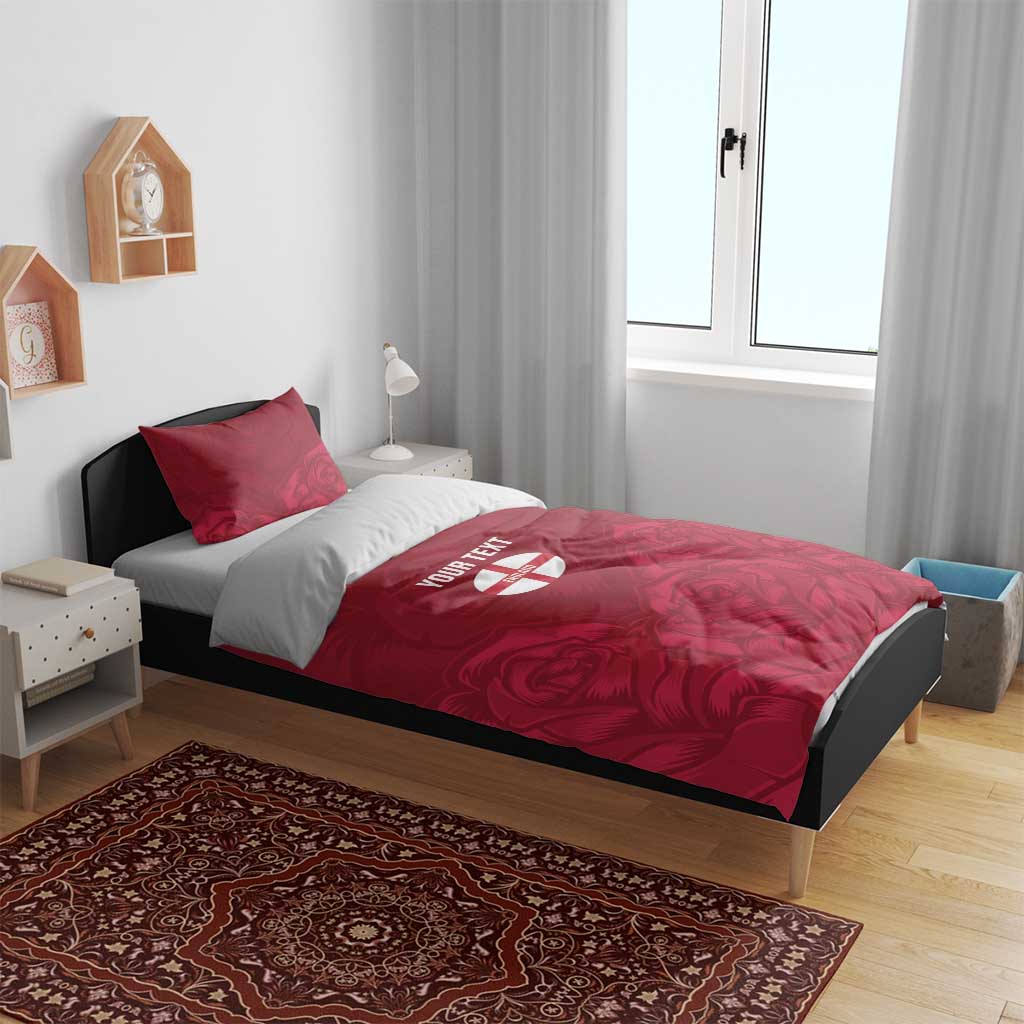 Red floral duvet with England emblem and 'YOUR TEXT', plus matching red pillow.