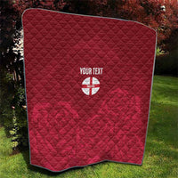 Red quilt with diamond stitched pattern and custom text over England crest emblem