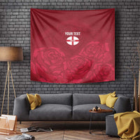 Red tapestry wall hanging with rose pattern and centered England crest-style logo