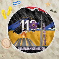 Round fringed beach blanket with black, yellow, blue 110th graphic and Never Forget text