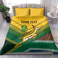 Green and yellow bedding set with “YOUR TEXT”, Go Bokke logo, and two yellow pillows