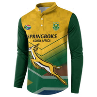 Green and yellow rugby button sweatshirt, side view, emblem and kangaroo graphic