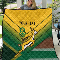 Custom rugby quilt with rugby player logo, “YOUR TEXT” text, and green-yellow-brown stripes
