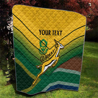 Custom rugby quilt showing green and yellow diagonal stripes, rugby player emblem, “YOUR TEXT”