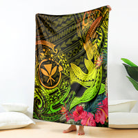 Colorful Polynesian shark and map graphic blanket with floral accents, green and yellow