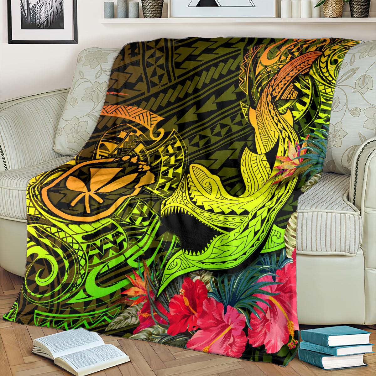 Polynesian shark tattoo blanket on couch, bright green patterns with red-pink hibiscus