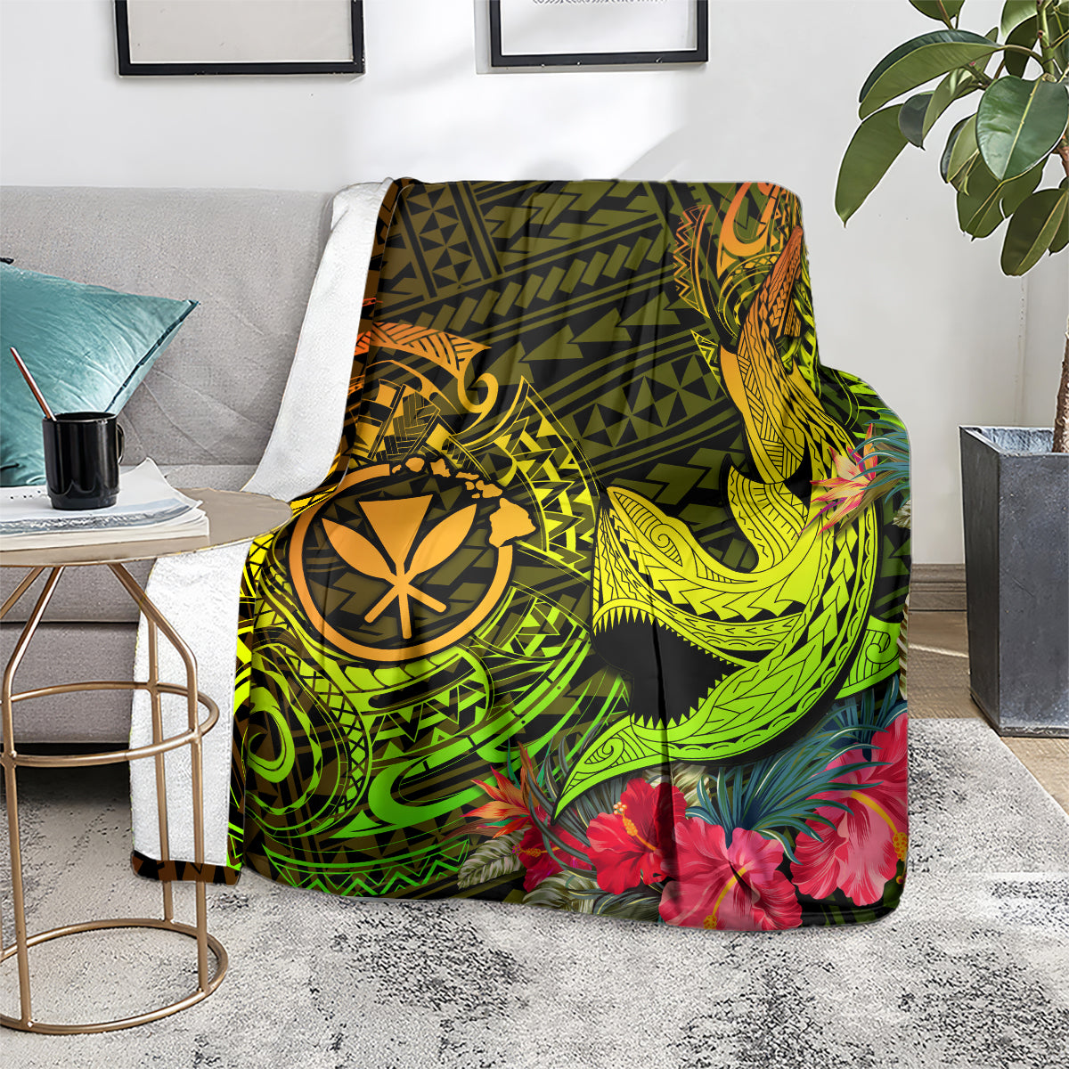 Polynesian shark tattoo blanket on floor, green and yellow tribal graphics with red flowers