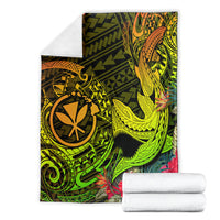 Folded Polynesian shark tattoo blanket, green and yellow map print with pink floral corner