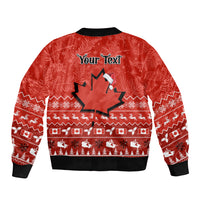 Red Christmas bomber jacket with custom text and maple-leaf star graphic, zip-front