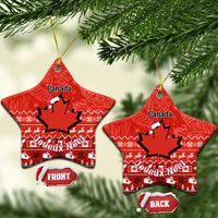 Red Canada ceramic Christmas ornament, star shape with maple leaf and Noel holiday pattern