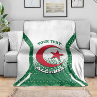 White and green Algeria coat-of-arms blanket draped on sofa with red crescent star