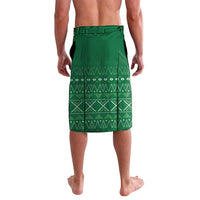 Green knee-length shorts with geometric border pattern and elastic waistband