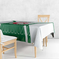 Green patterned tablecloth with Algeria coat of arms and pointed edge drape