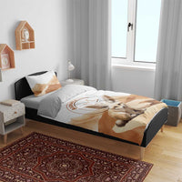 White duvet on bed with tan fox graphic and matching pillowcases; bedroom styled view