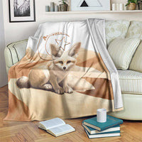 Algeria Sahara blanket with Chihuahua-like dog print and arched Algeria emblem, on chair