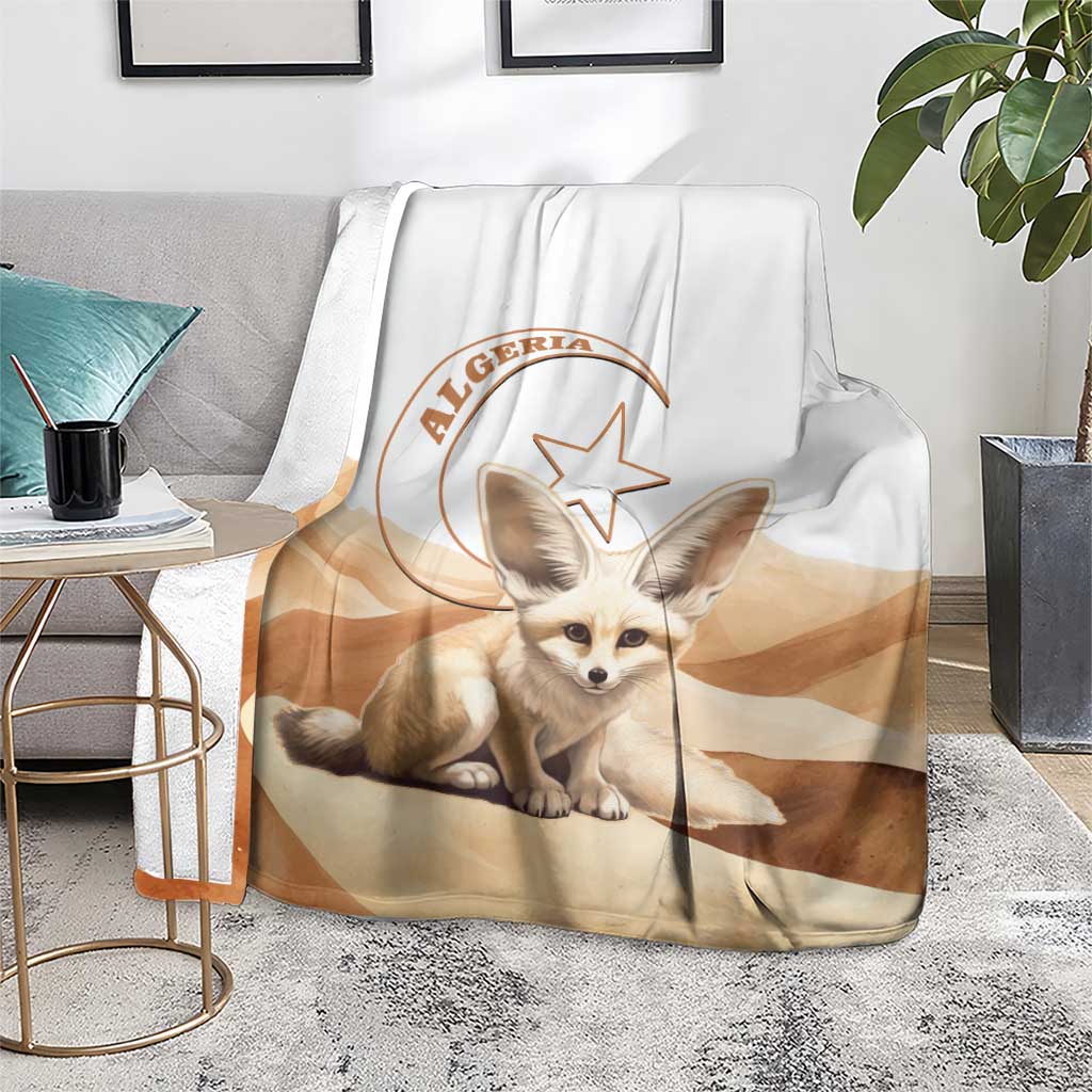 Algeria Sahara blanket with dog and Algeria emblem, draped over gray chair