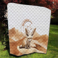Algerian quilt blanket with white diamond stitching, tan landscape panels, and fennec fox