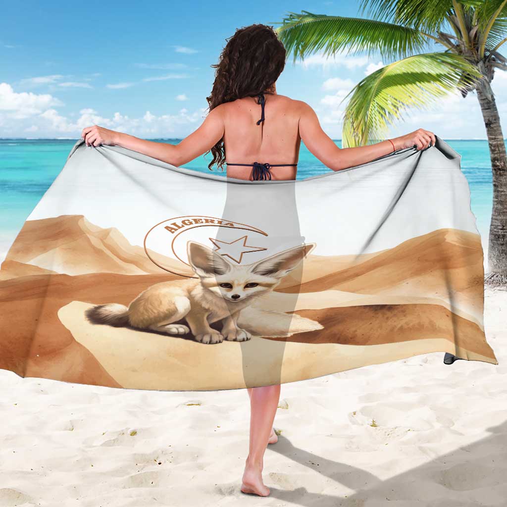 White sarong with fennec fox graphic and Algeria star emblem, held wide by model