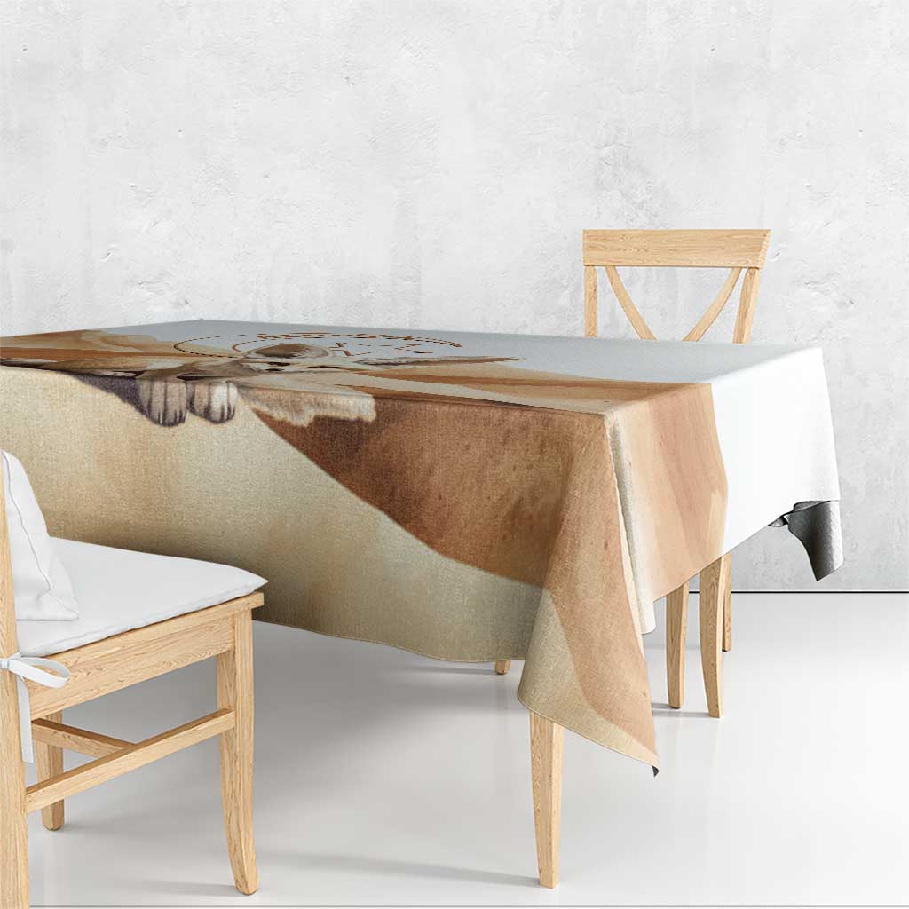 Fennec fox tablecloth in white with tan desert print, shown on a tabletop and bench.