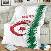 White Algeria football blanket on beige sofa with green streaks and “YOUR TEXT” logo