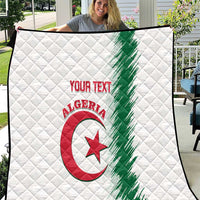 White quilt with quilted diamond pattern, Algeria logo, green diagonal stripe, red text