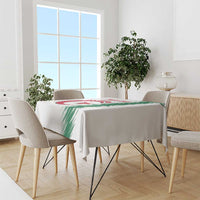 White Algeria football tablecloth with green stripe design on dining table