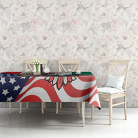 Printed tablecloth with blue star motif, red-and-white stripes, and green Aztec-style section