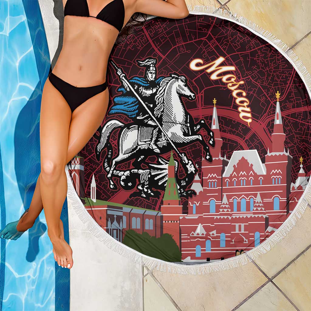 Close-up round red beach blanket with fringe, Moscow towers and knight-on-horse print
