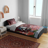 Red duvet with Moscow skyline map print and knight on horseback; matching pillow shams