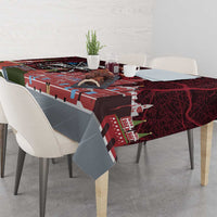 Red and gray tablecloth with geometric city skyline pattern, spread across table